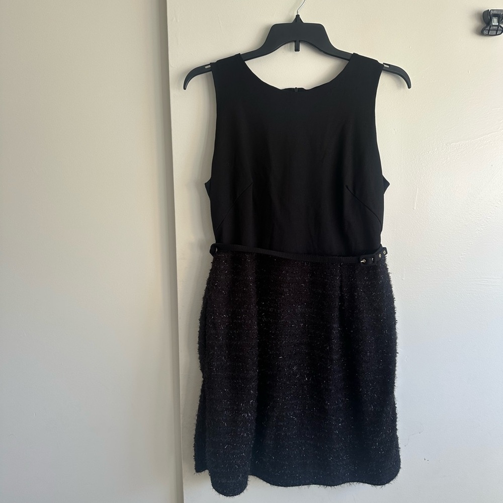Classic Black Sleeveless Mini Dress with Textured Skirt